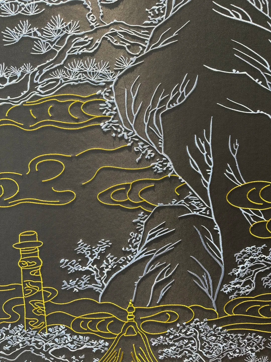 Close-up of Dunhuang-inspired embroidered linework